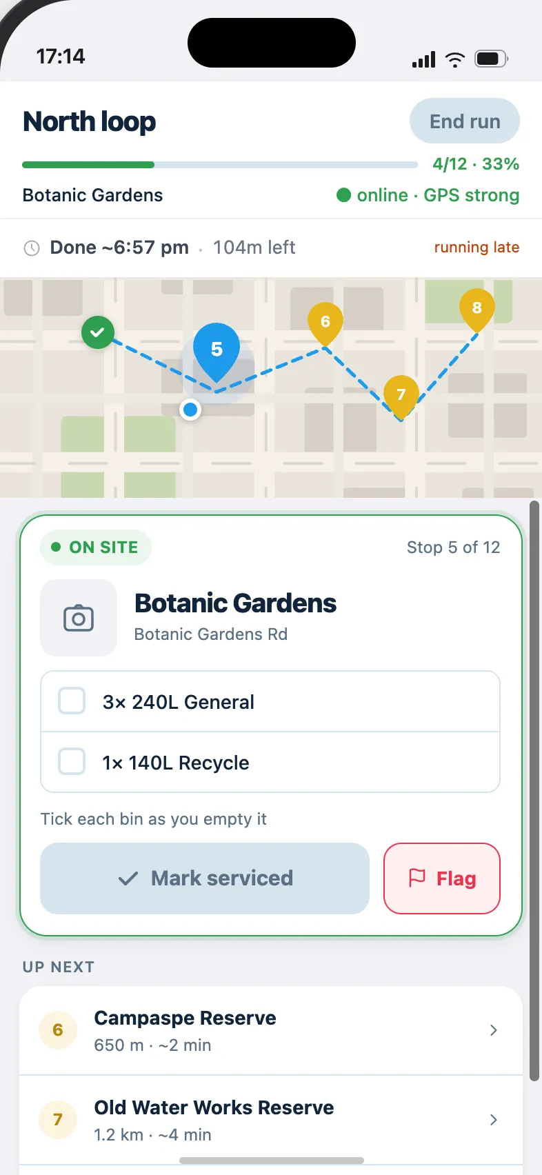 The Howyabin driver app in Run Mode: a live route map with serviced and pending bins, the on-site bin card for Botanic Gardens with its bin types, and Mark serviced and Flag actions.